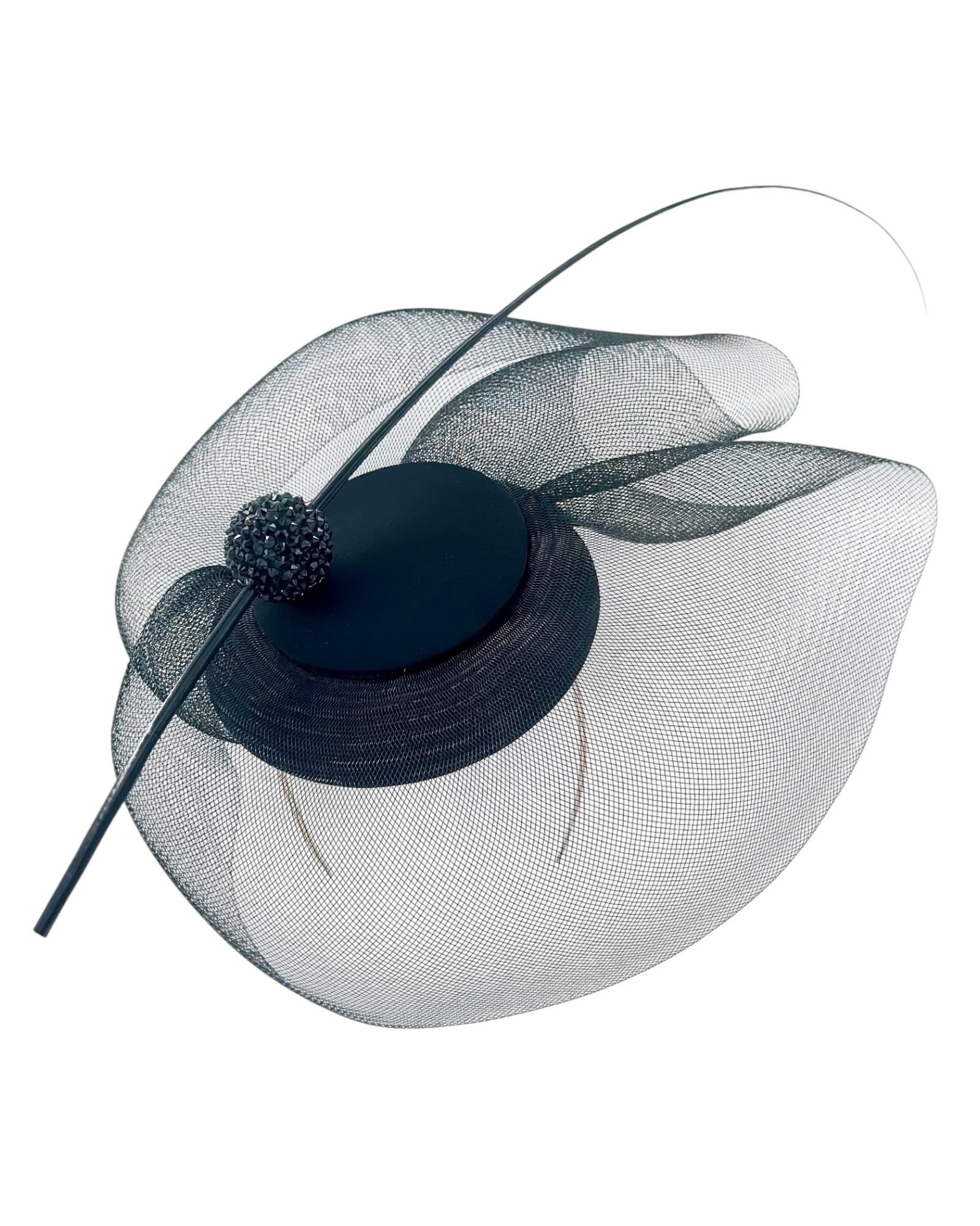 Black crinoline cocktail hat seen from above, showing the sculpted layers of sheer crinoline and the sweeping quill, Maria Monica London