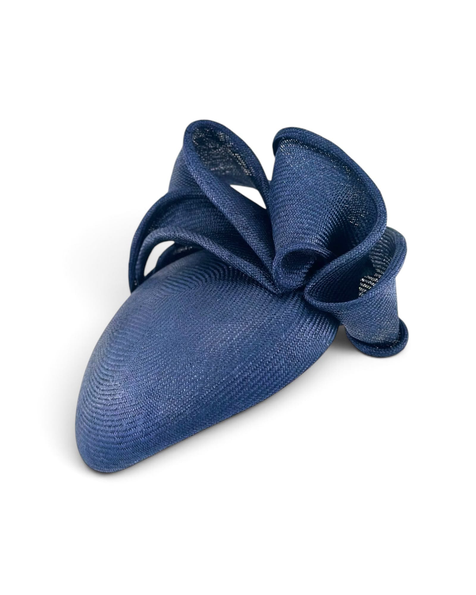 Midnight navy straw cocktail hat with a sculpted straw bow, shown off the head, Maria Monica London
