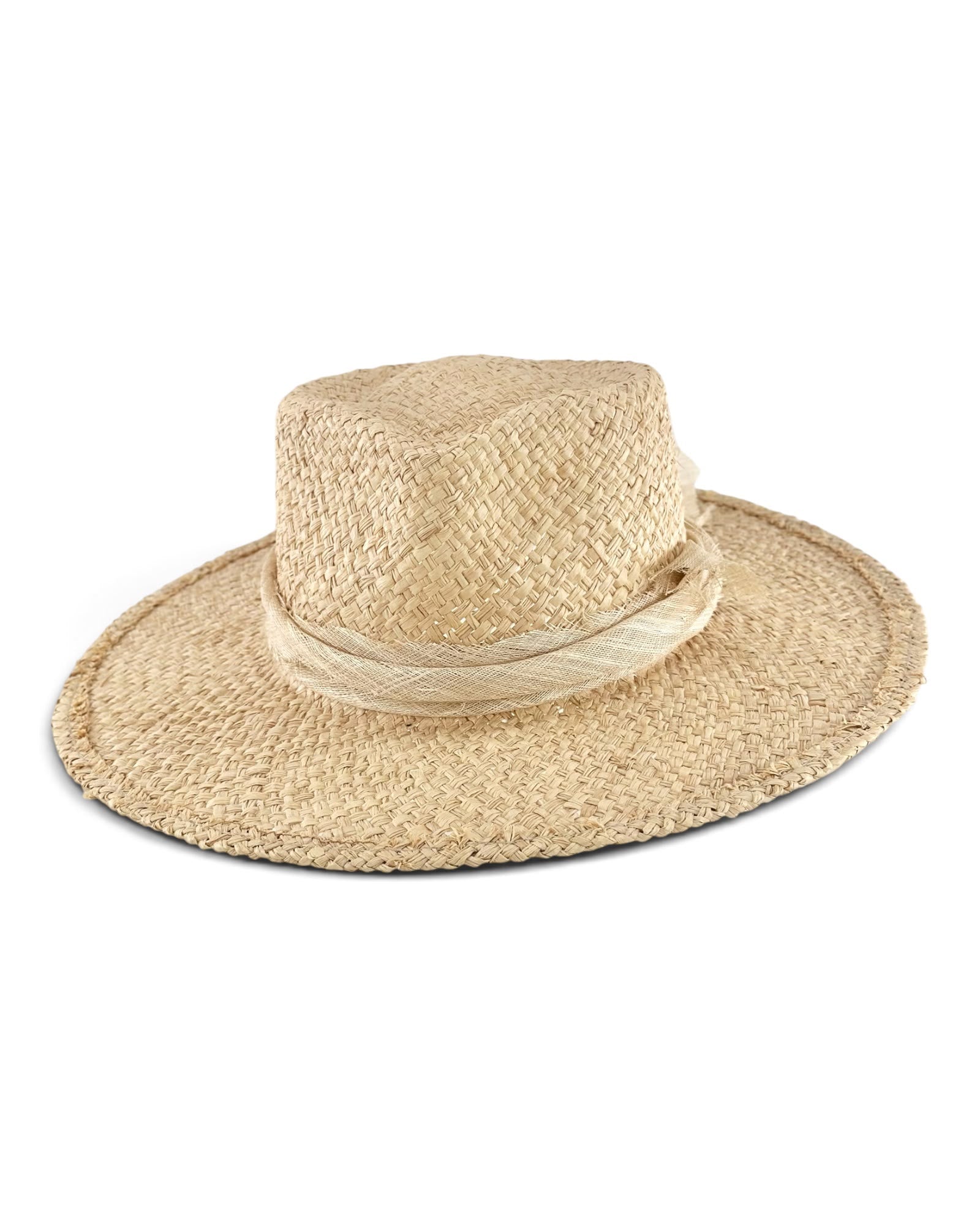 Natural sand raffia fedora seen from above, showing the full oval brim and the open basket weave of the crown, Maria Monica London