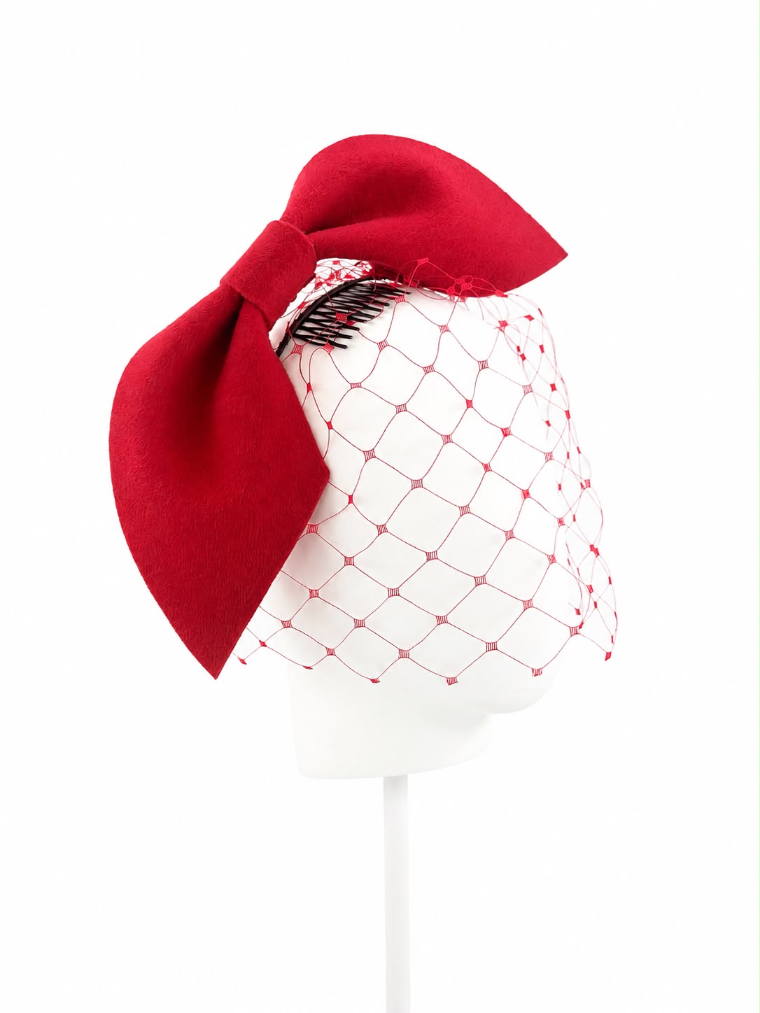 Scarlet felt bow headpiece on a hair-matched headband with hidden comb, Maria Monica London