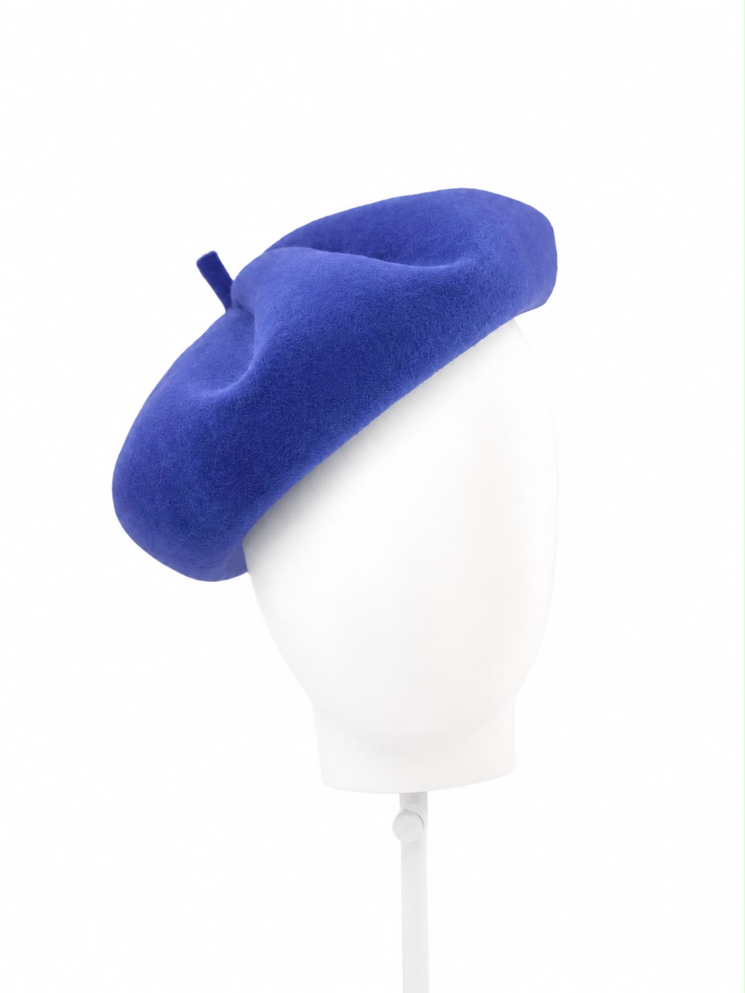 Cobalt blue sculpture beret worn angled, Maria Monica London