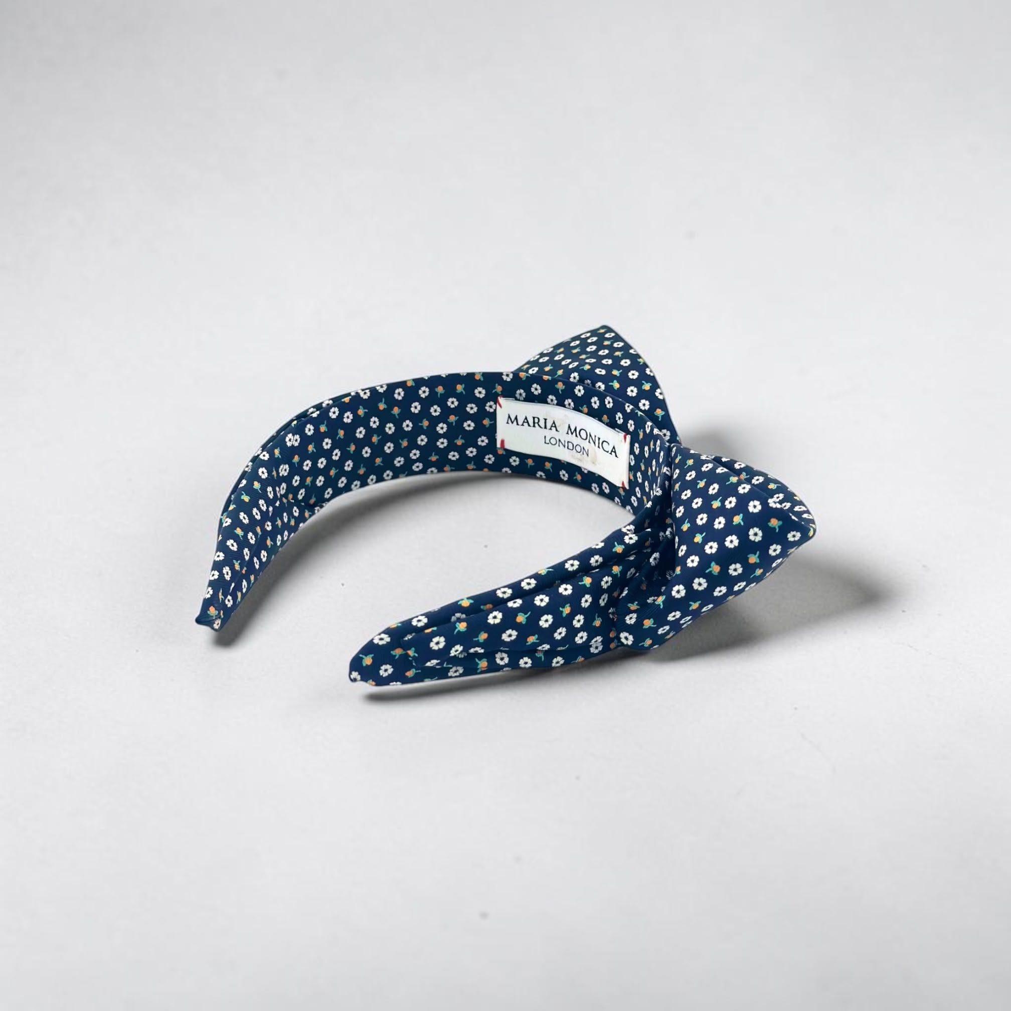Silk bow headband with the Maria Monica London atelier label