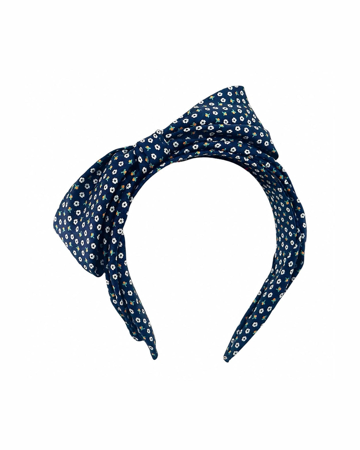 Navy silk bow headband with a small floral print, hand wired and finished in the London atelier by couture milliner Maria Monica London