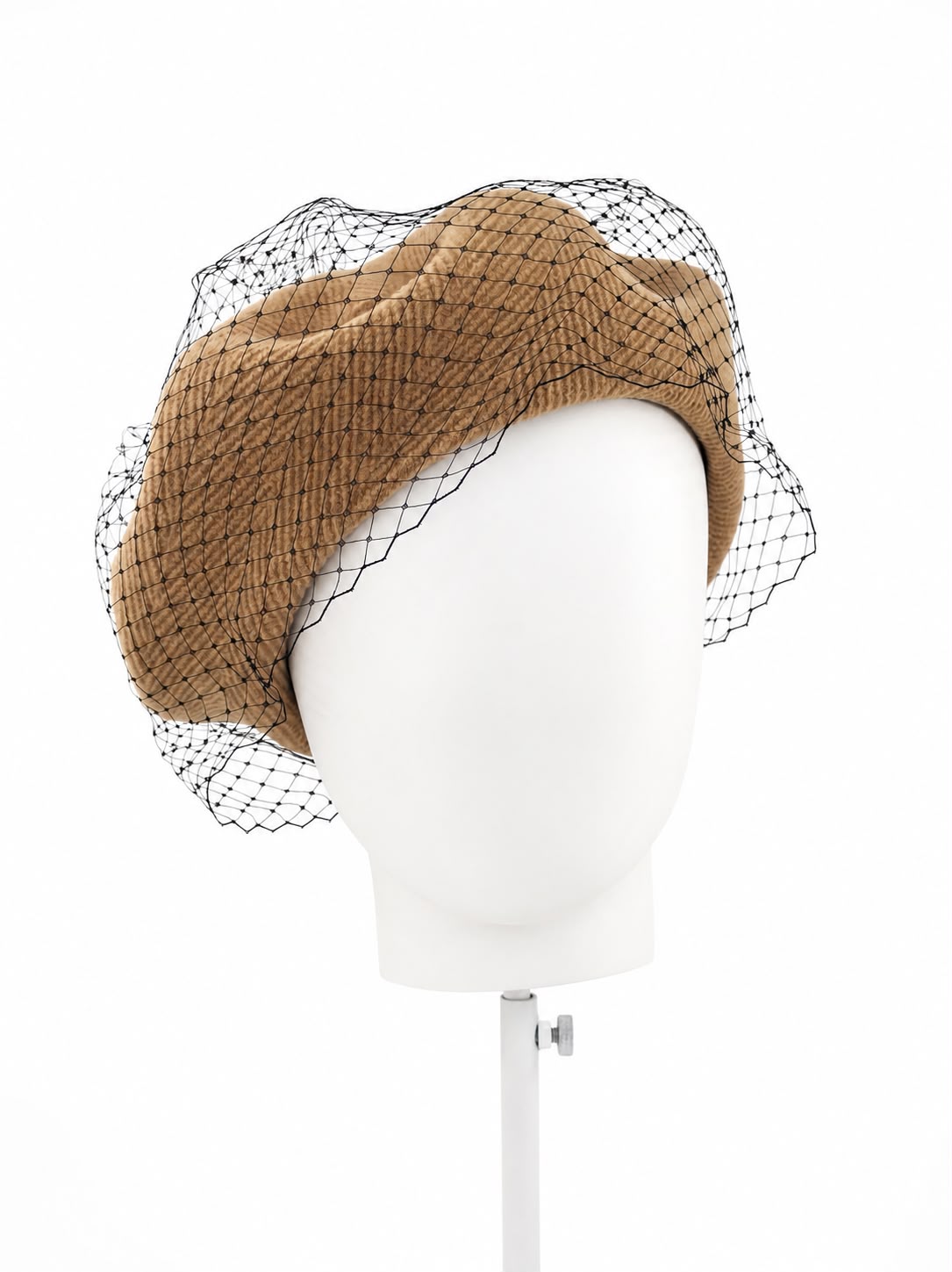 Caramel wool beret with black net veiling falling over it, side view on a display head, Maria Monica London