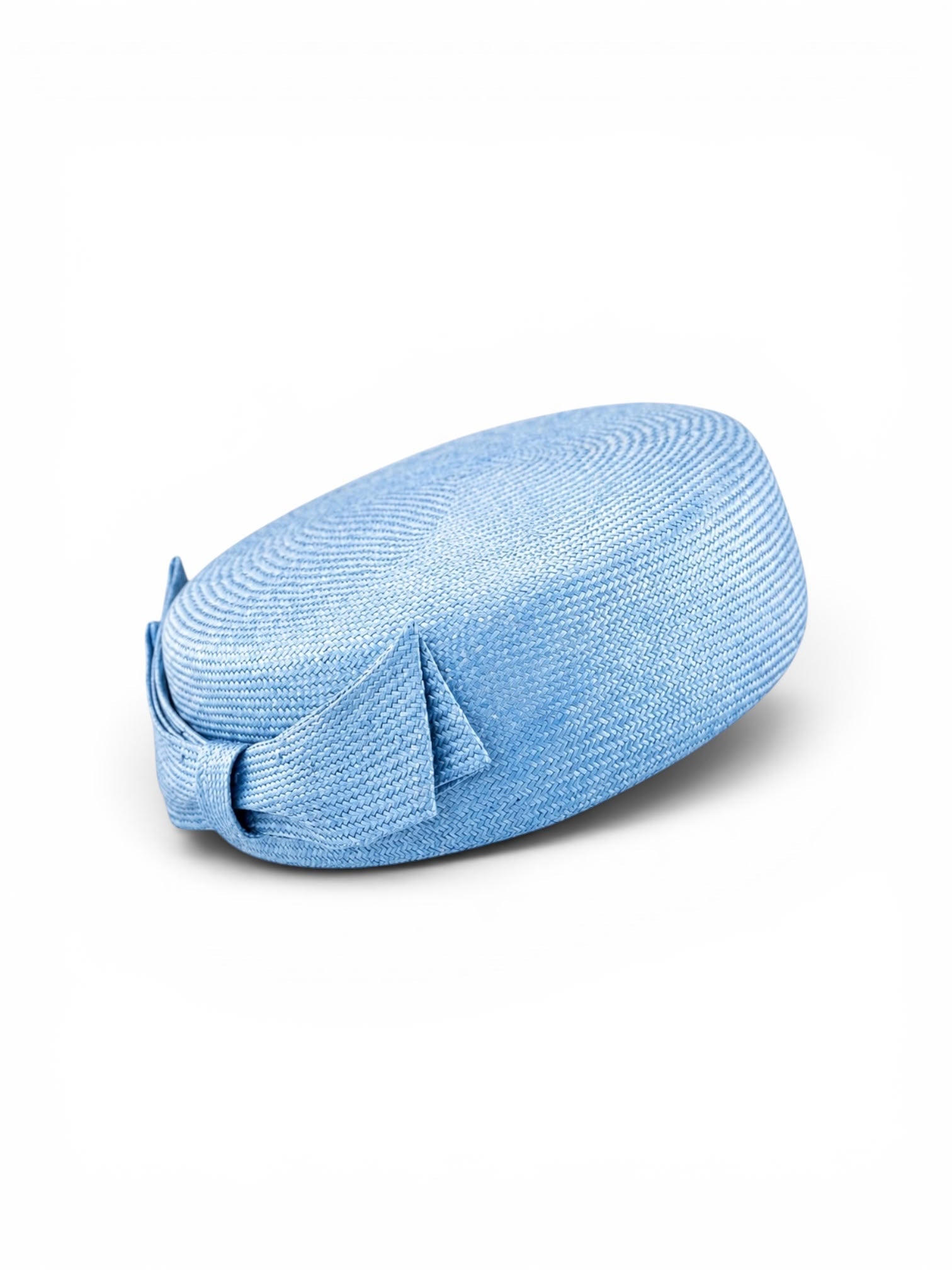 Ice blue parasisal pillbox hat, angled view, Maria Monica London