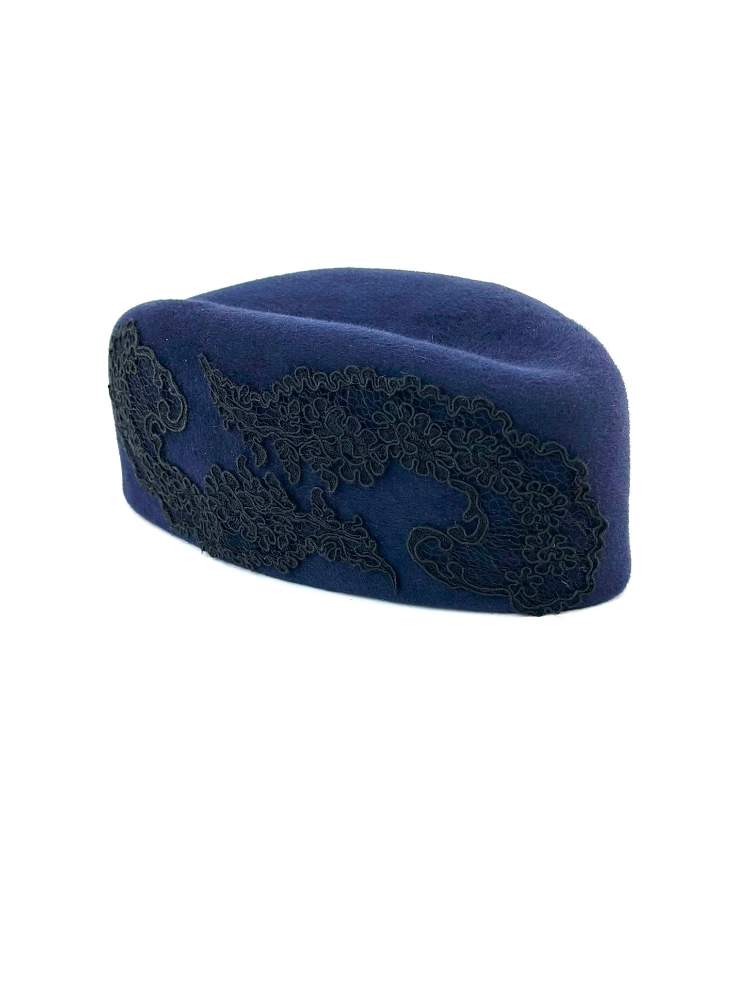 Navy felt pillbox hat with black lace motif, couture milliner London