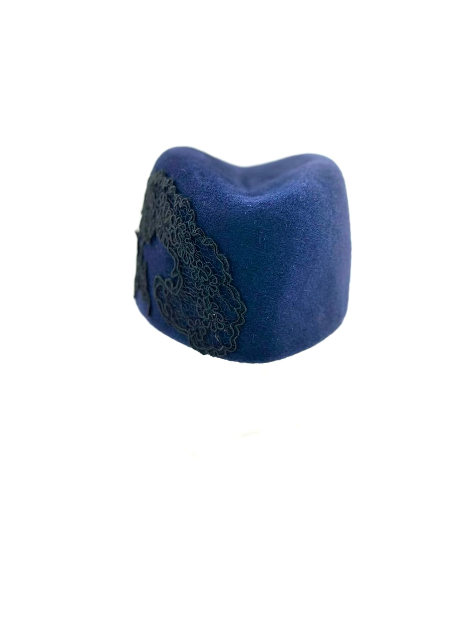 Navy lace sculptural pillbox hat, angle view, Maria Monica London