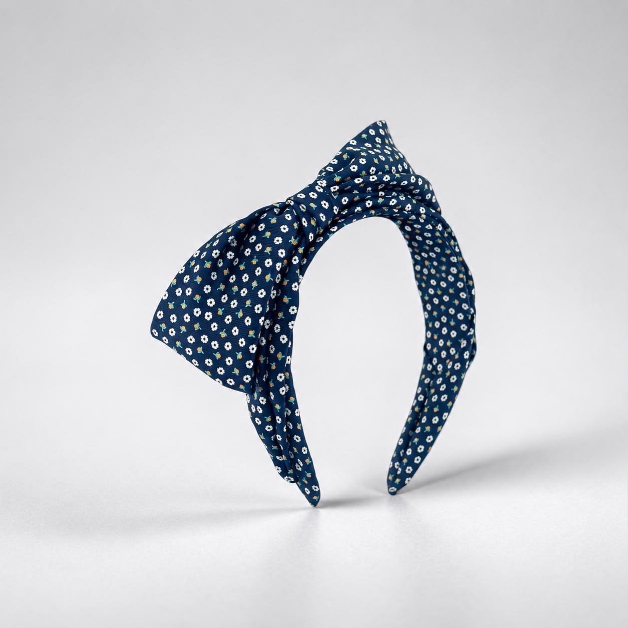 Navy floral silk bow headband, hand-sculpted bow, Maria Monica London