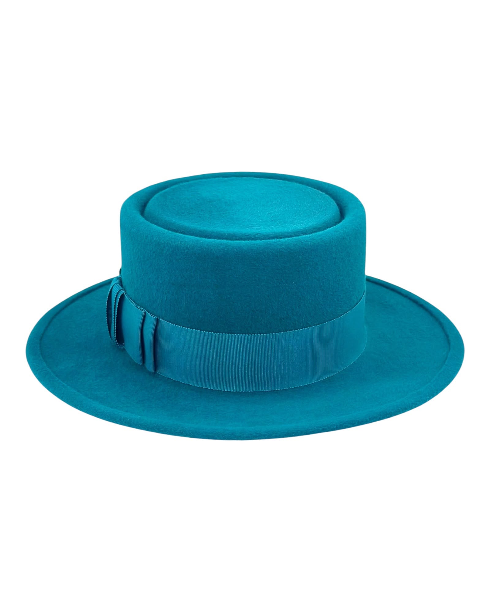 Front view of the turquoise felt boater showing the recessed crown top and the tonal grosgrain band, handmade in London