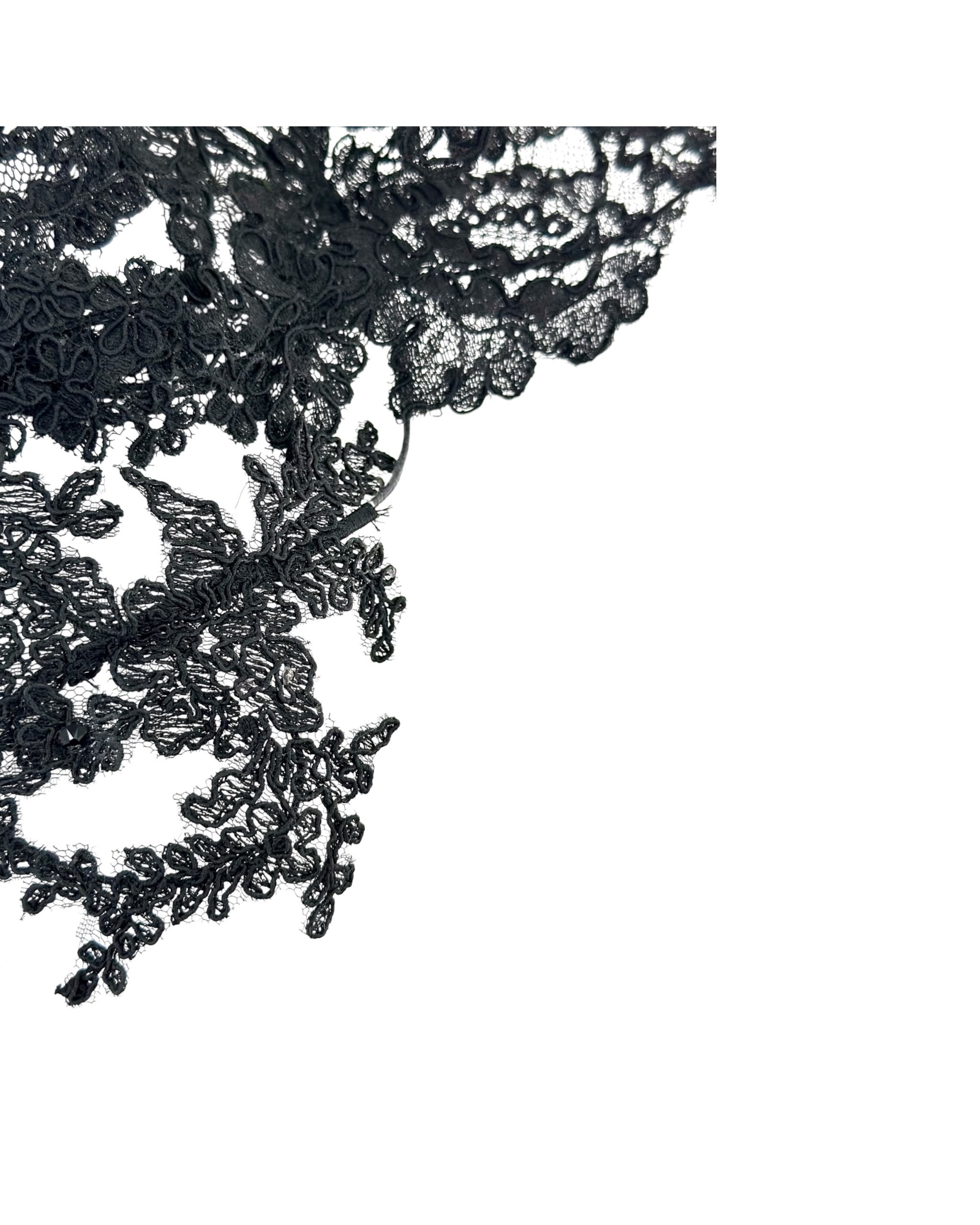 Close view of the black floral lace edge and the thin headband wire on the lace mask